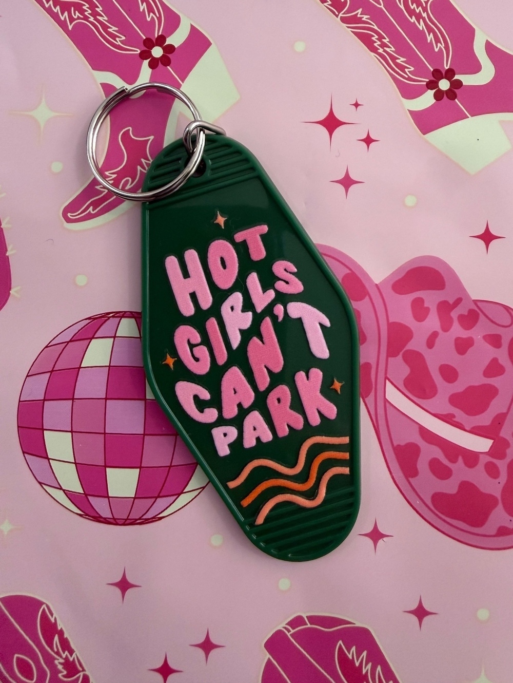 Green Keychain with Pink 'Hot Girls Can't Park' Text
